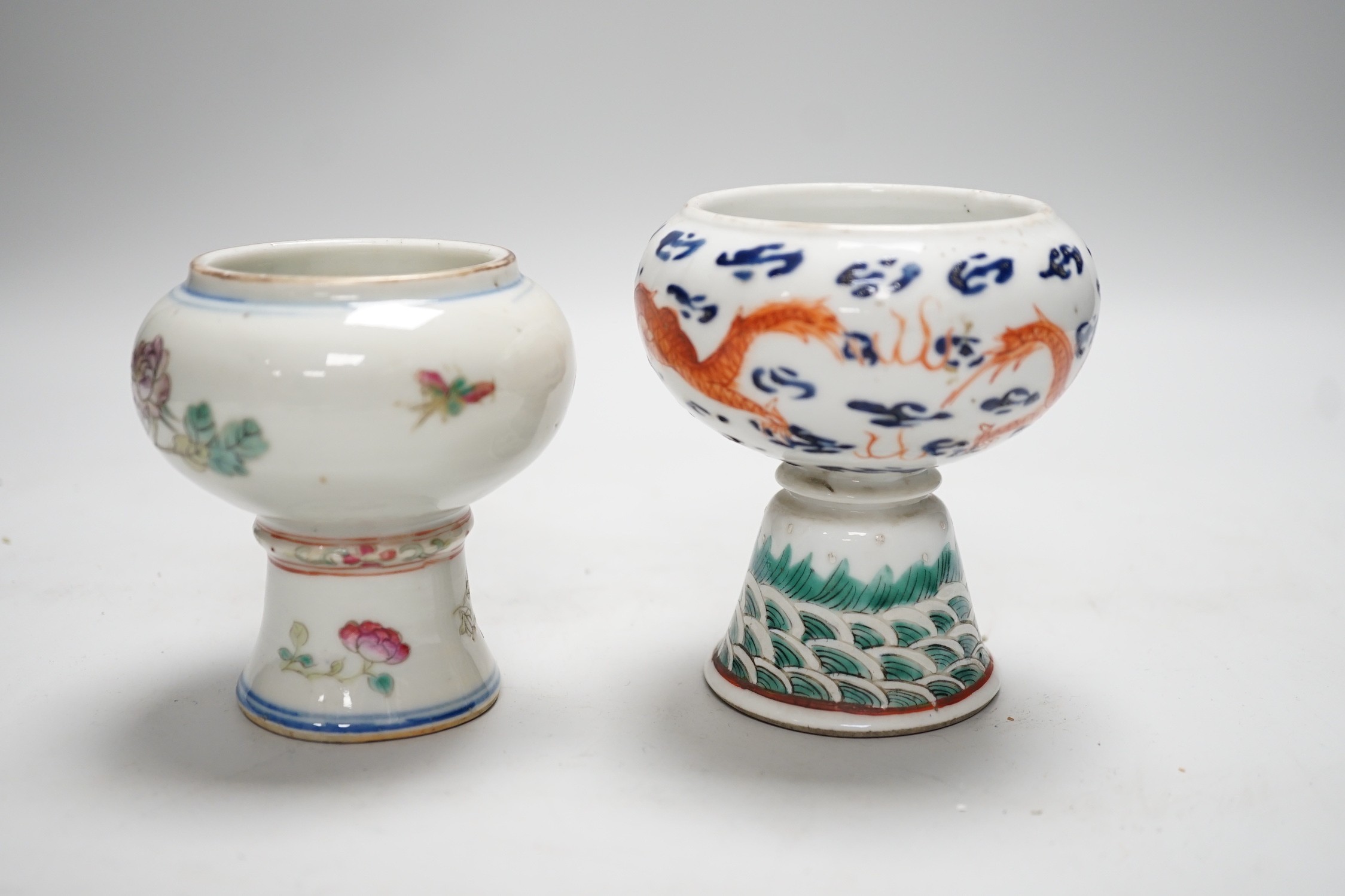 Two 19th century Chinese enamelled porcelain stem bowls, The first painted with Dragons chasing a flaming pearl, 10cm, the second painted with a bird amid flowers